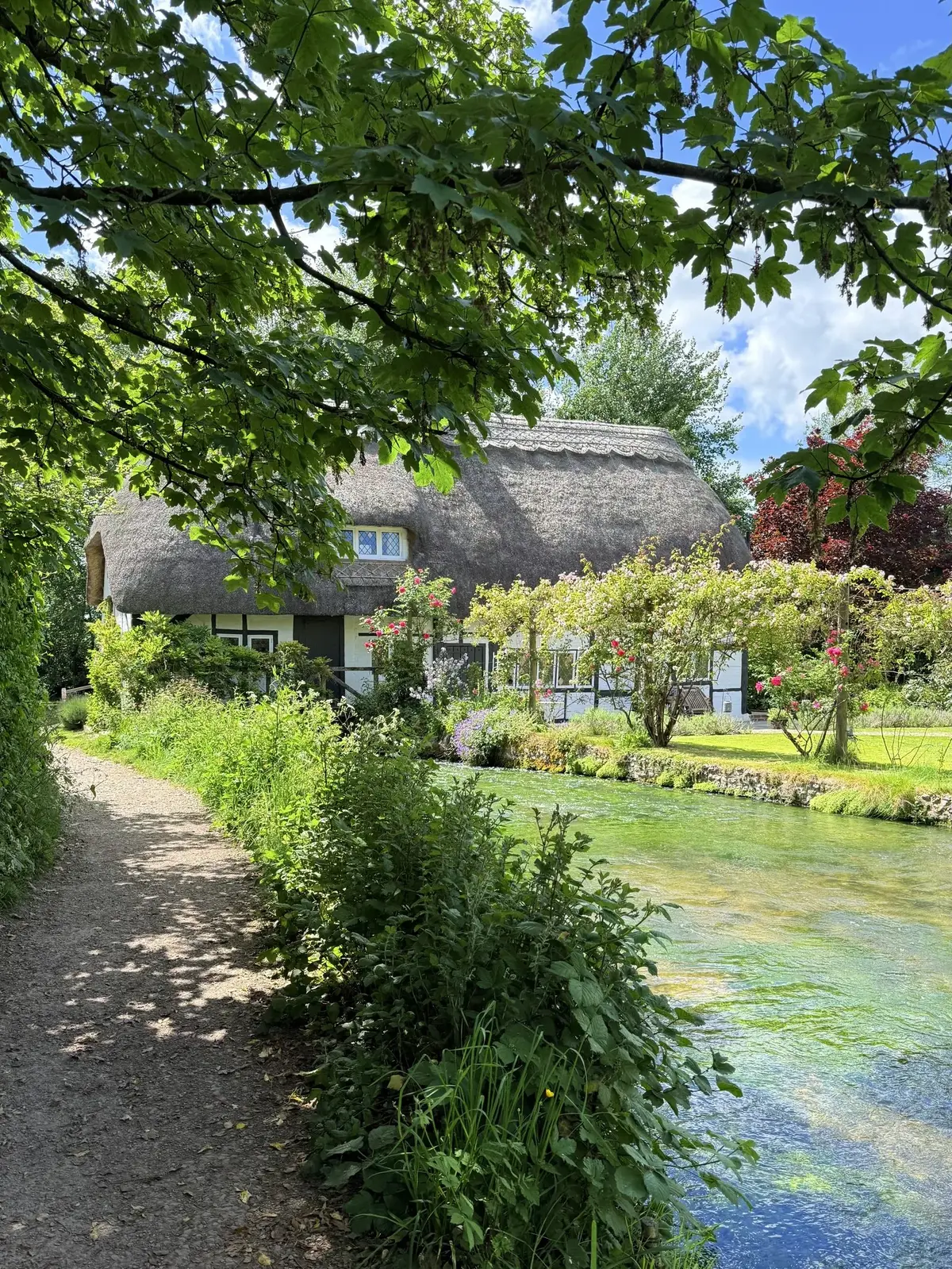 Thatched cottage by the river